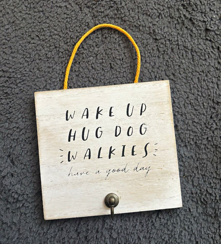 Hanging wooden dog - sign, plaque